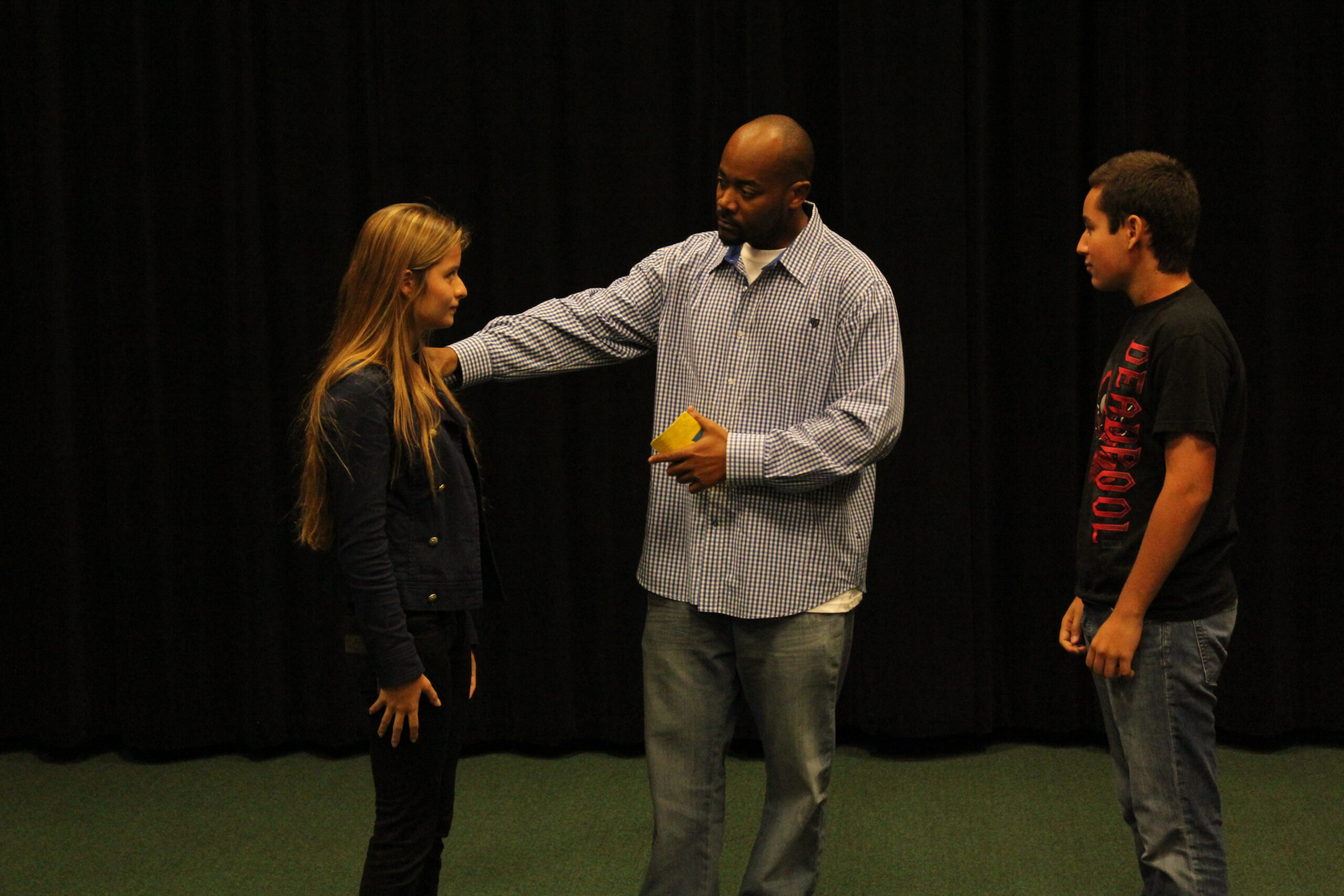 Tavares Beverly leading corporate team building exercises with a workshop group