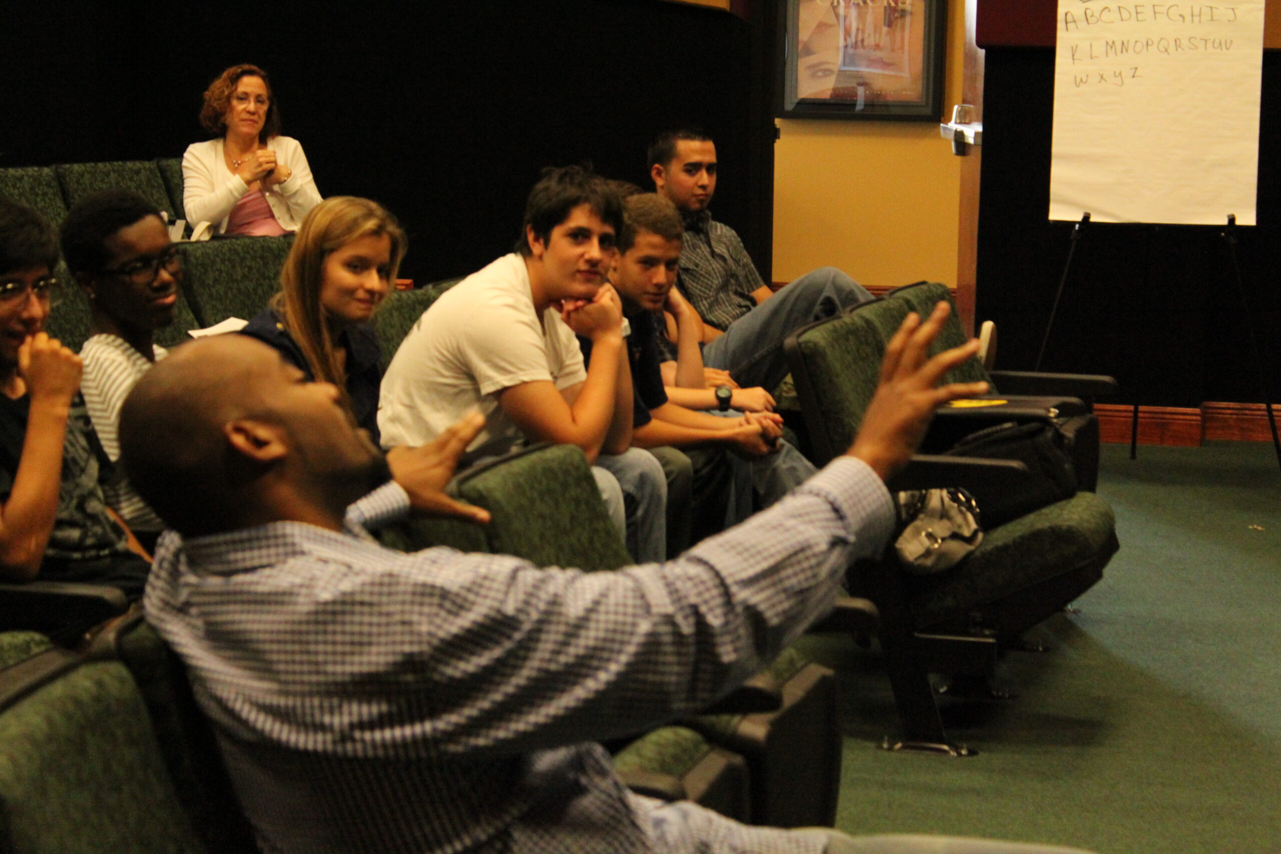 Tavares Beverly teaching a filmmakers workshop to students